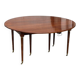 Solid mahogany dining table from the Louis XVI period, extendable.