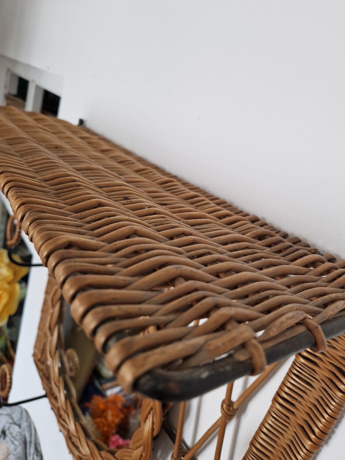 Woven wicker coat rack