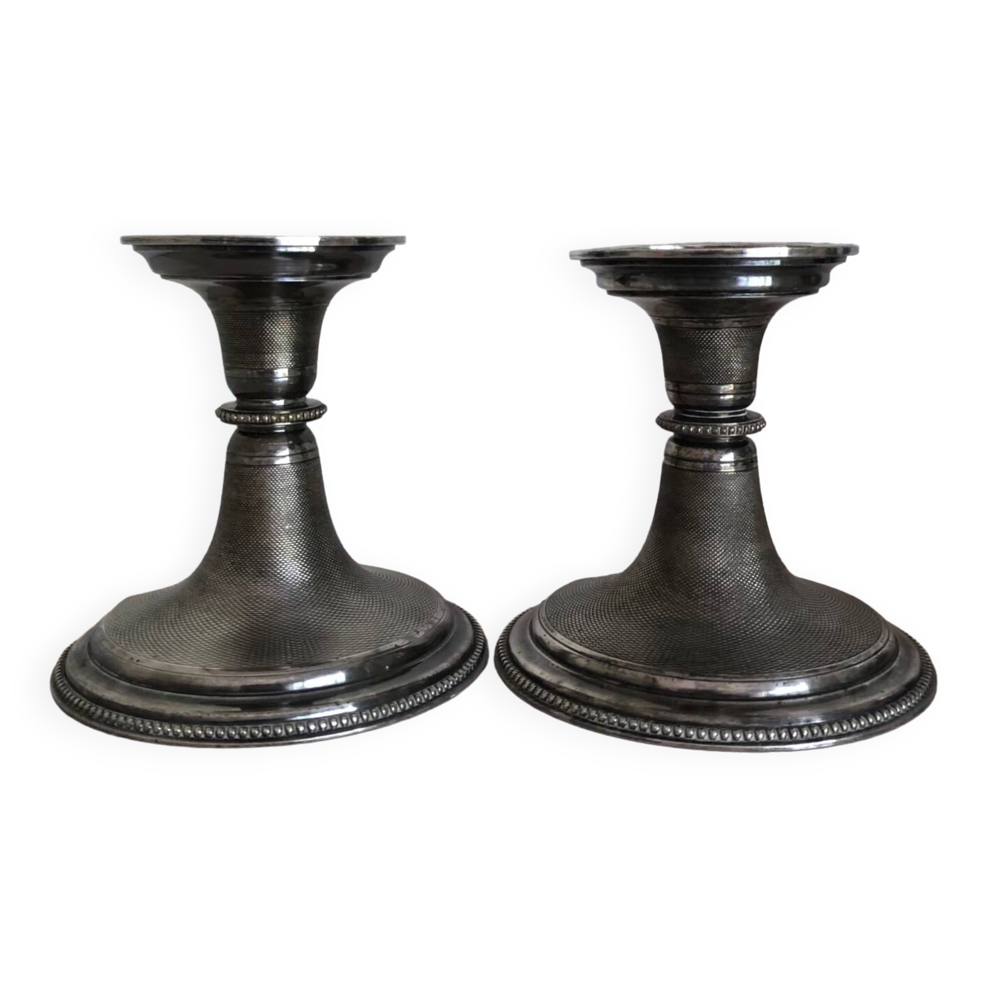 Silver candlesticks by TH HENRY