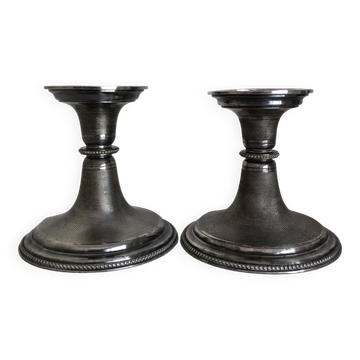 Silver candlesticks by TH HENRY