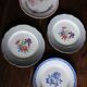 A set of 4 flat plates in pink and blue with Fontanges flowers from Sarreguemines.