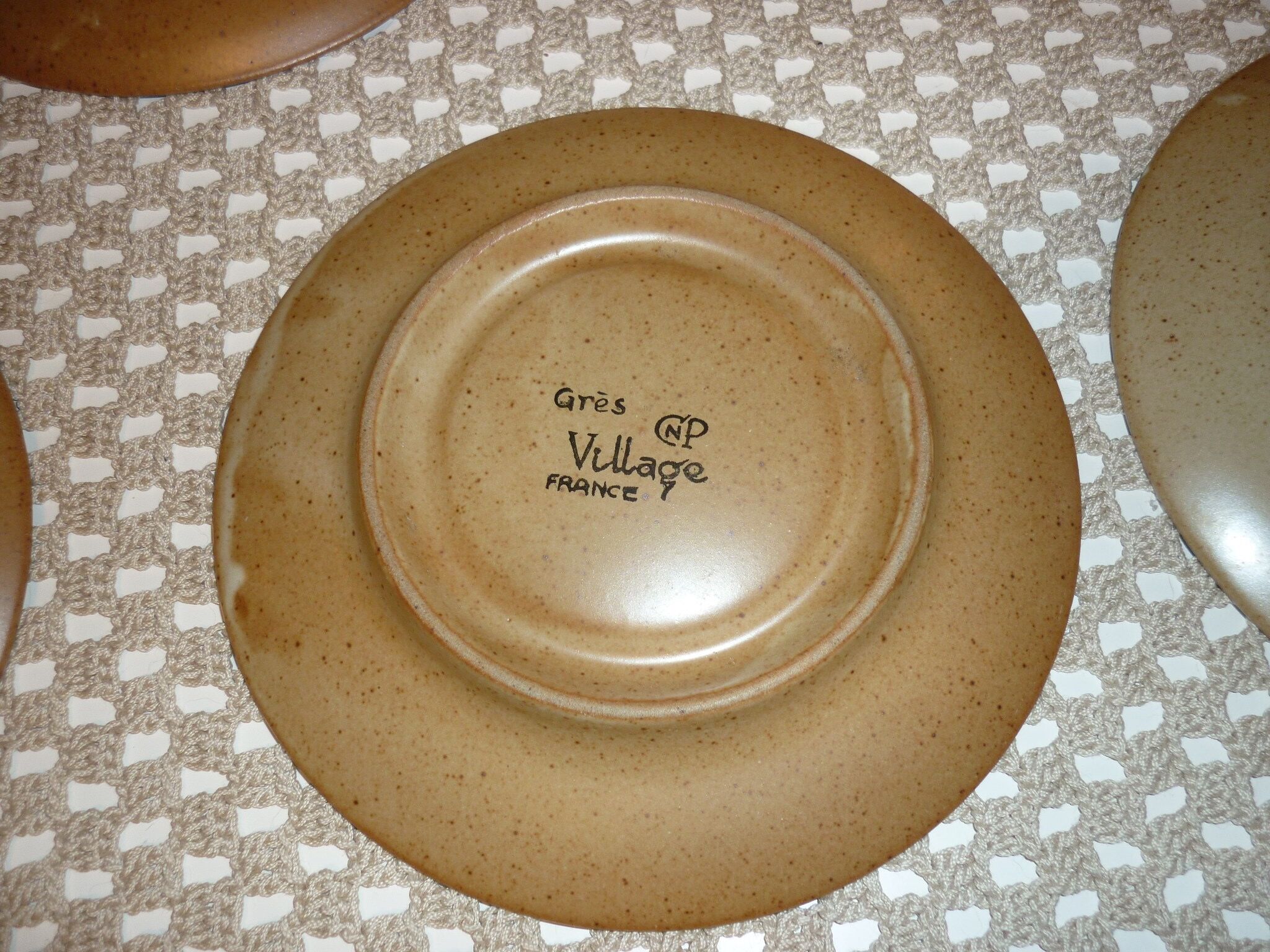Pair of CNP Village France stoneware saucers