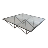 Black lacquered metal coffee table with a clear glass top. Attributed to Paolo Piva.
