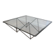 Black lacquered metal coffee table with a clear glass top. Attributed to Paolo Piva.