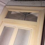 Large glazed door and its old glazed transom.