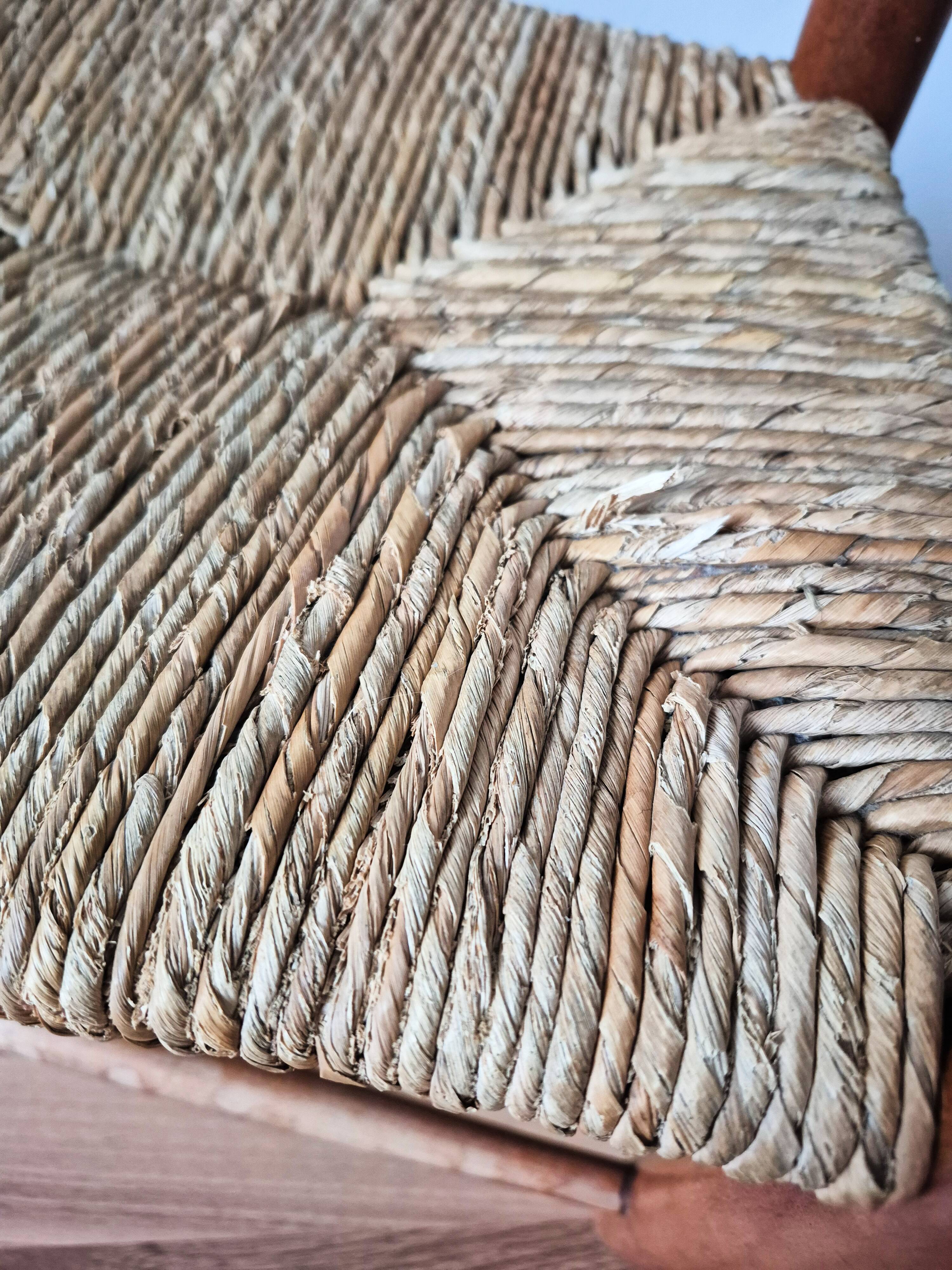 Vintage wooden and straw children's armchair