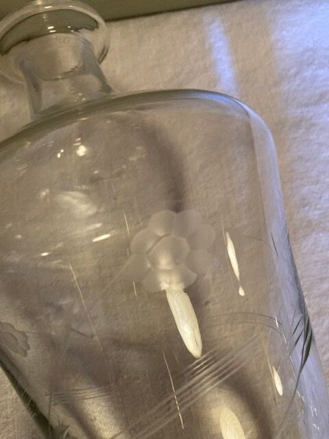 Glass carafe engraved with flowers