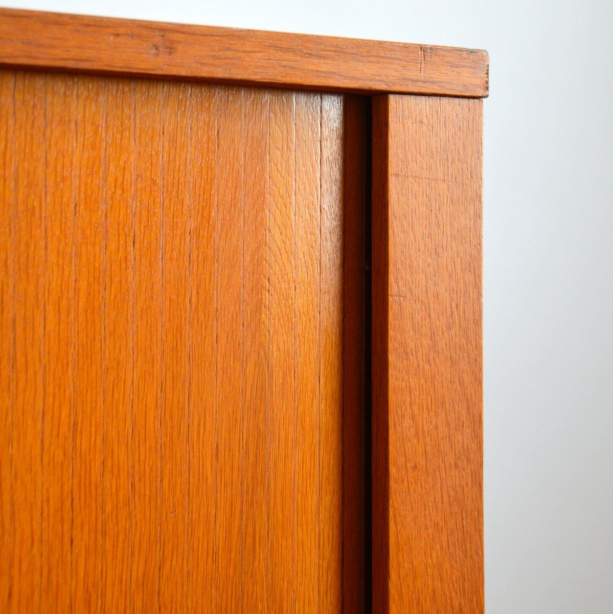 Storage cabinet with sliding curtain shutter 1950s