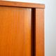 Storage cabinet with sliding curtain shutter 1950s