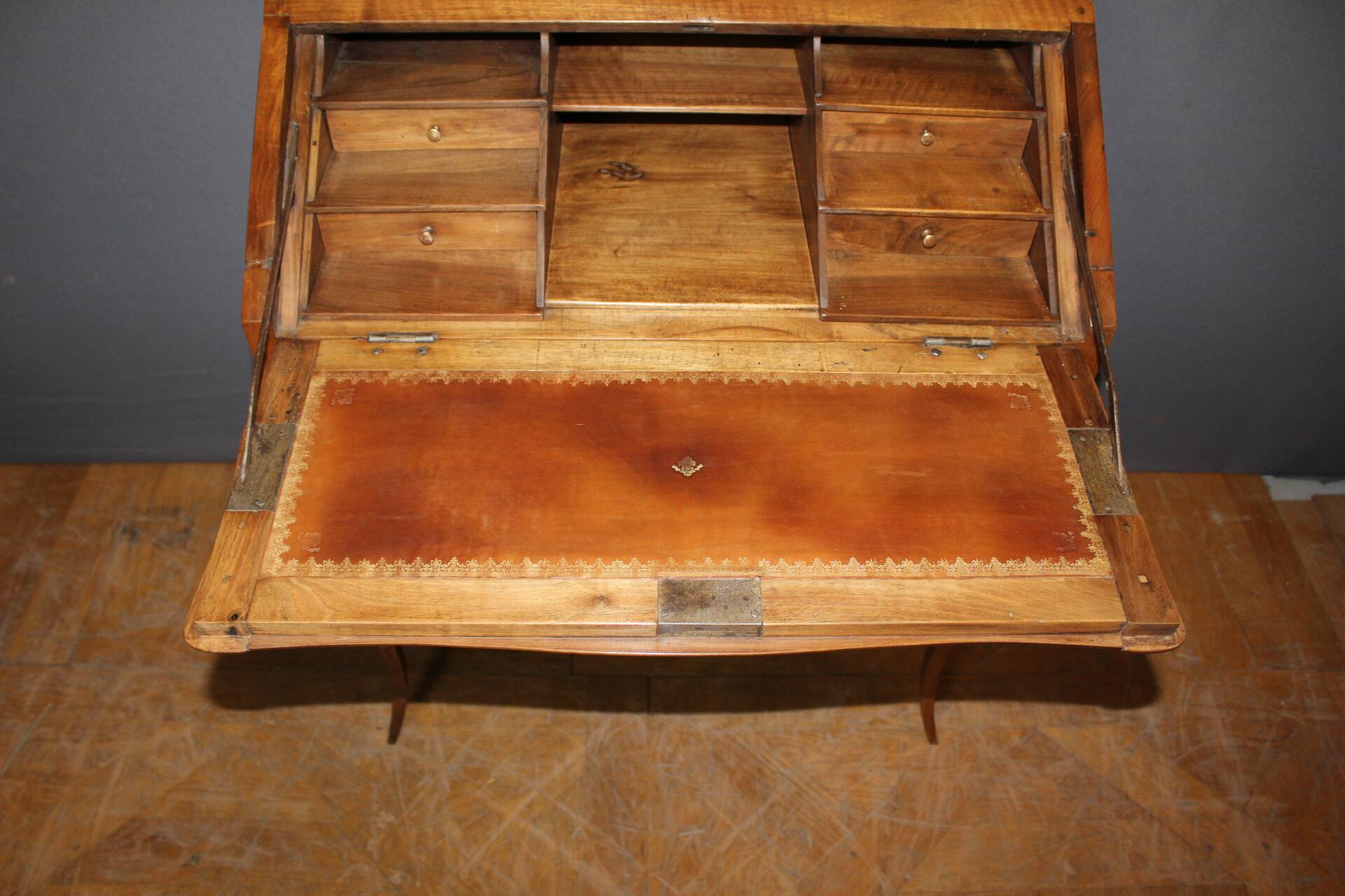 Louis XV donkey back desk in 18th century walnut