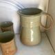 Jug and its vintage stoneware glasses