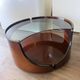 Italian Space Age coffee table in curved wood and smoked glass – 1970s