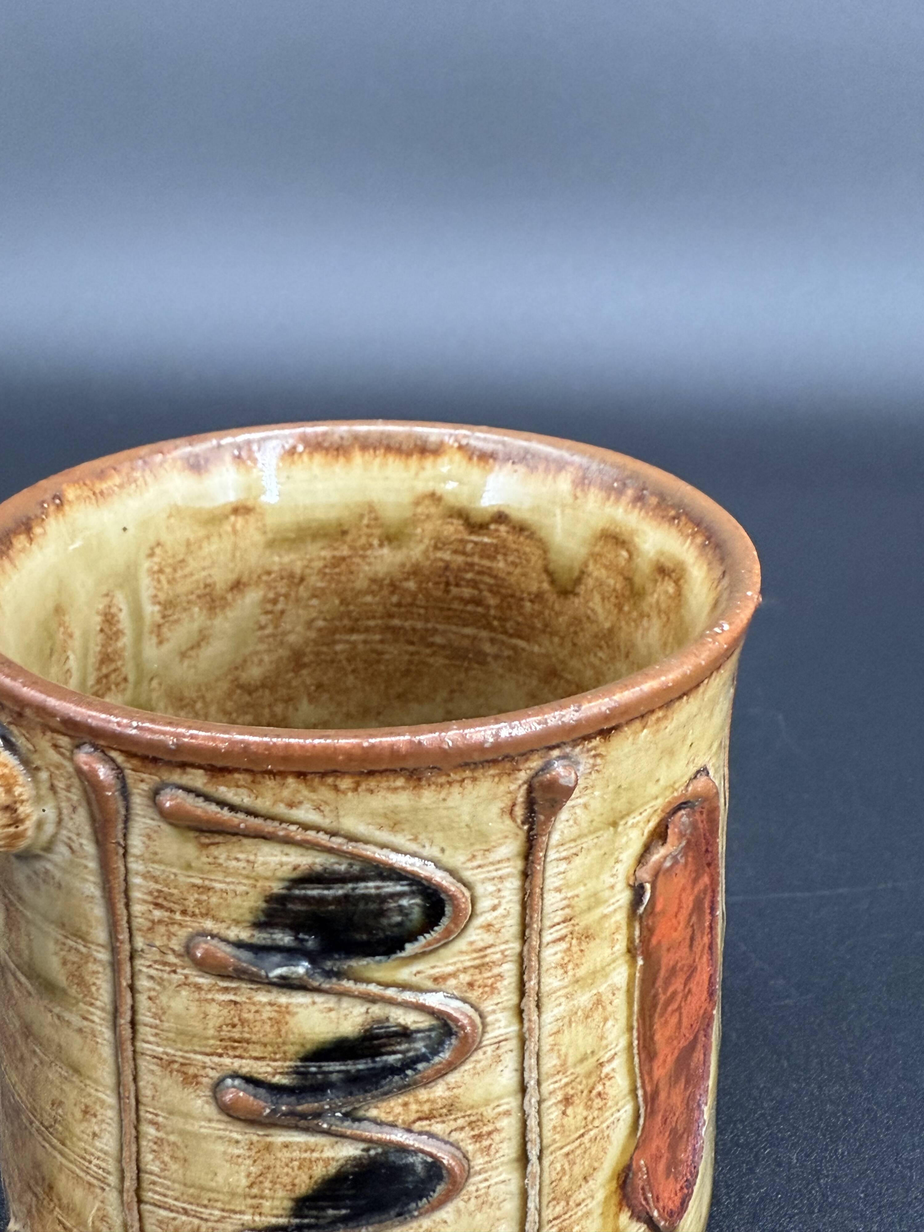 Pair of glazed stoneware mugs — abstract decor from the 70s