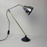 Old articulated industrial workshop lamp