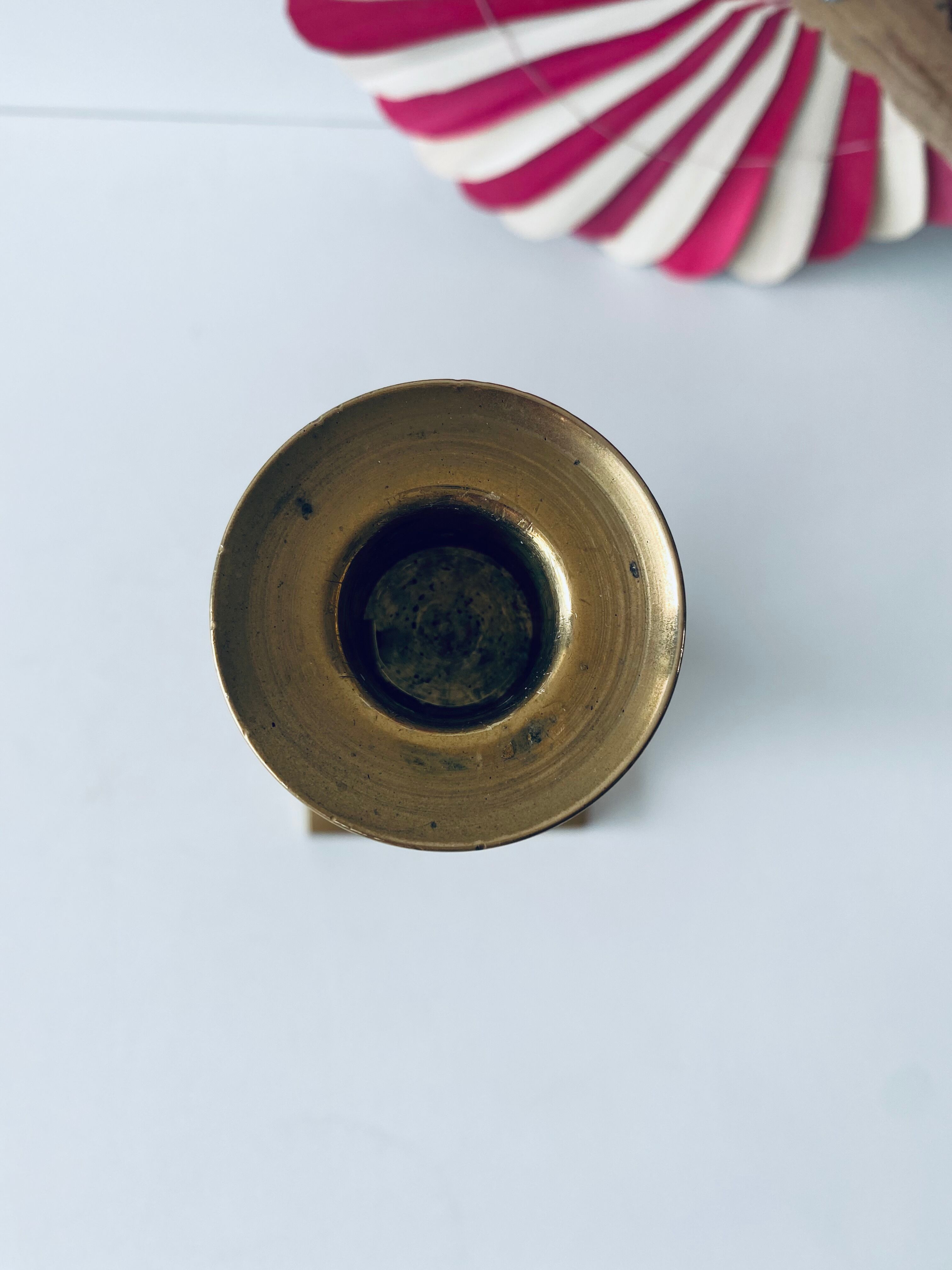 Old candle holder in brass and wood