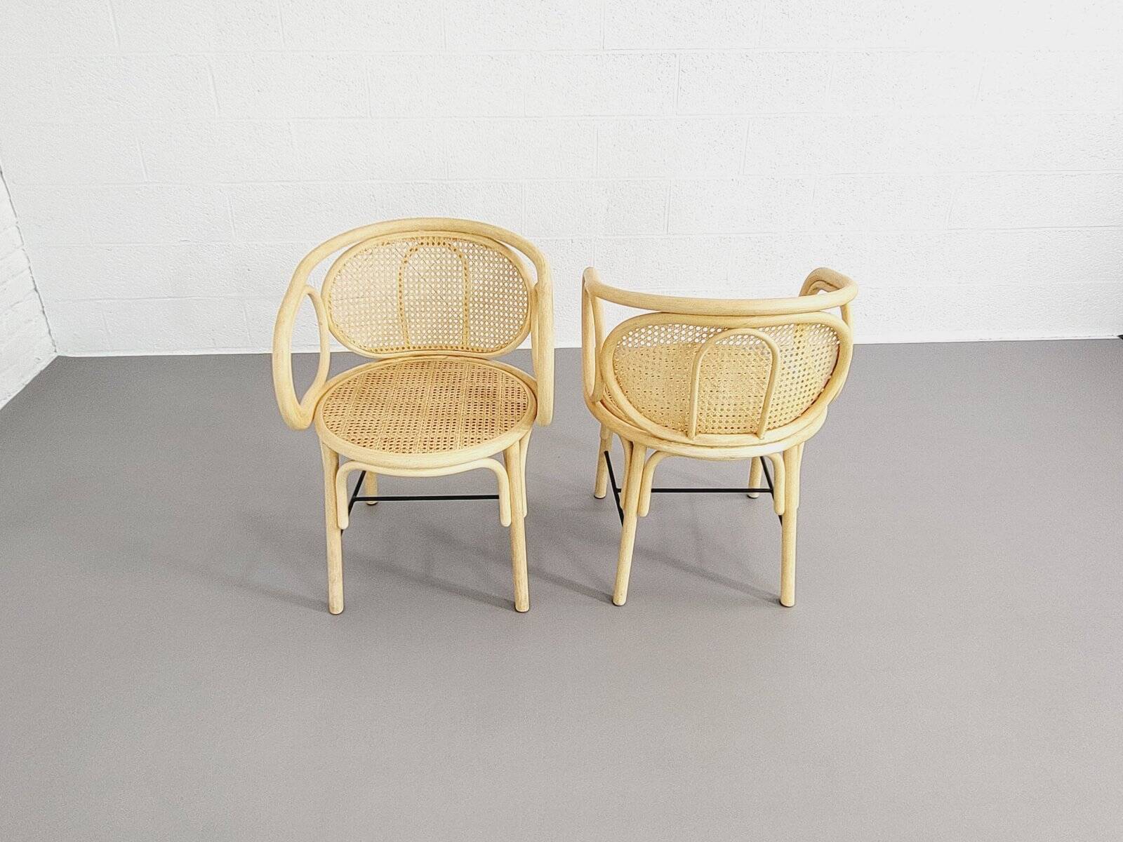 Paire de fauteuils en rotin et cannage