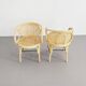 Paire de fauteuils en rotin et cannage