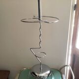 Designer umbrella stand in chrome metal and wood.