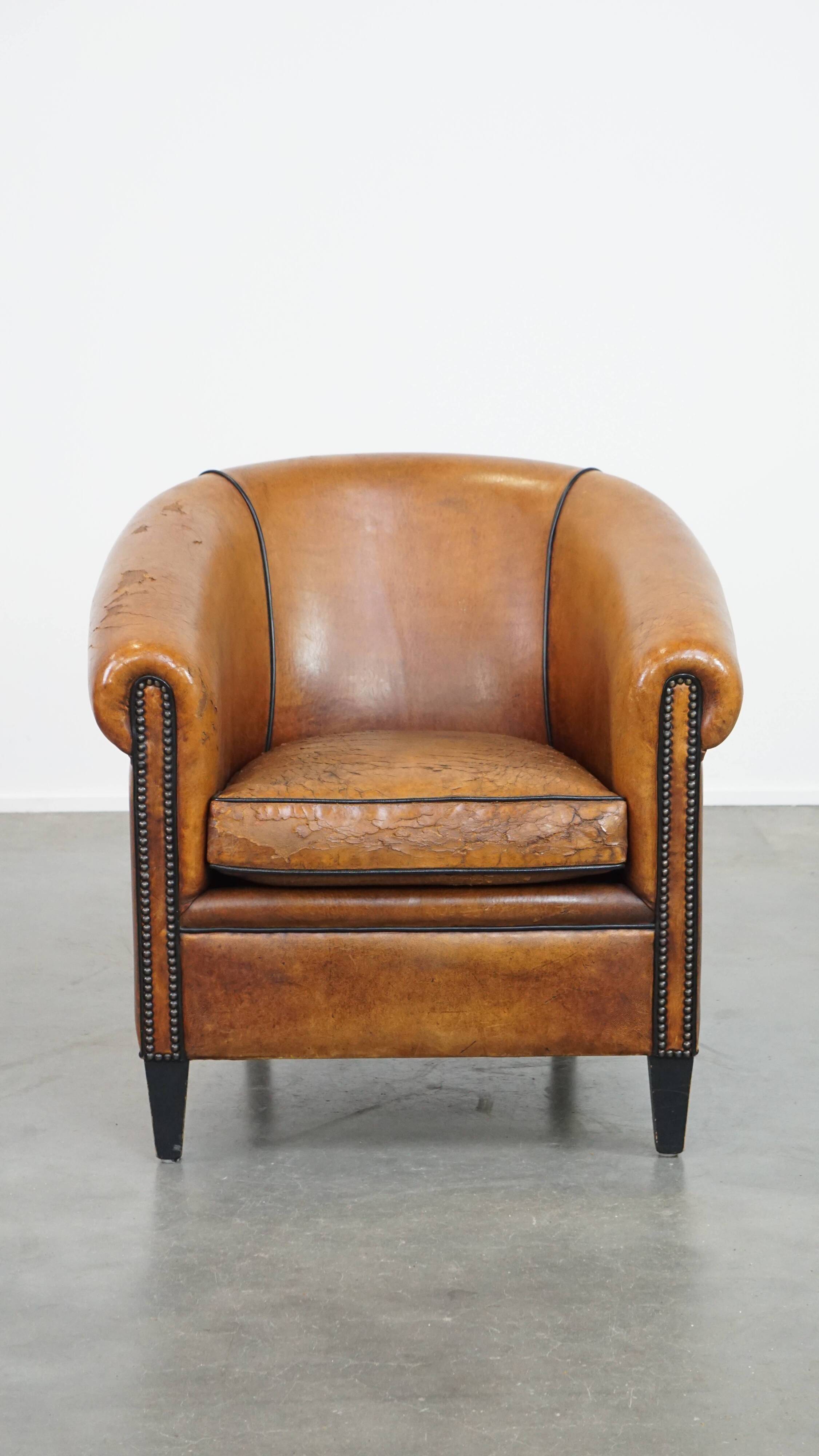 Sheep leather club chair with patina