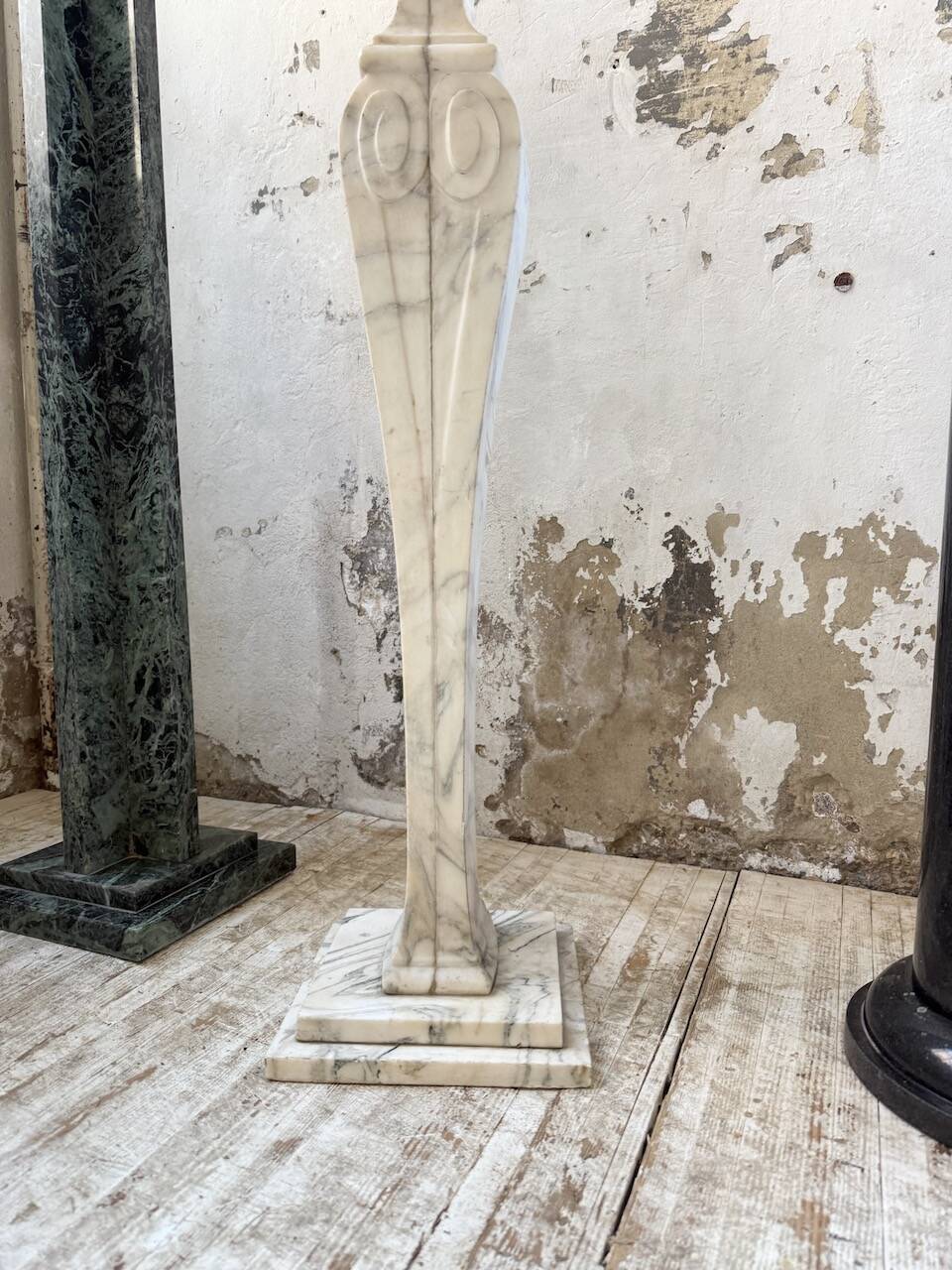 Set of 4 marble columns or pedestals.