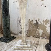 Set of 4 marble columns or pedestals.
