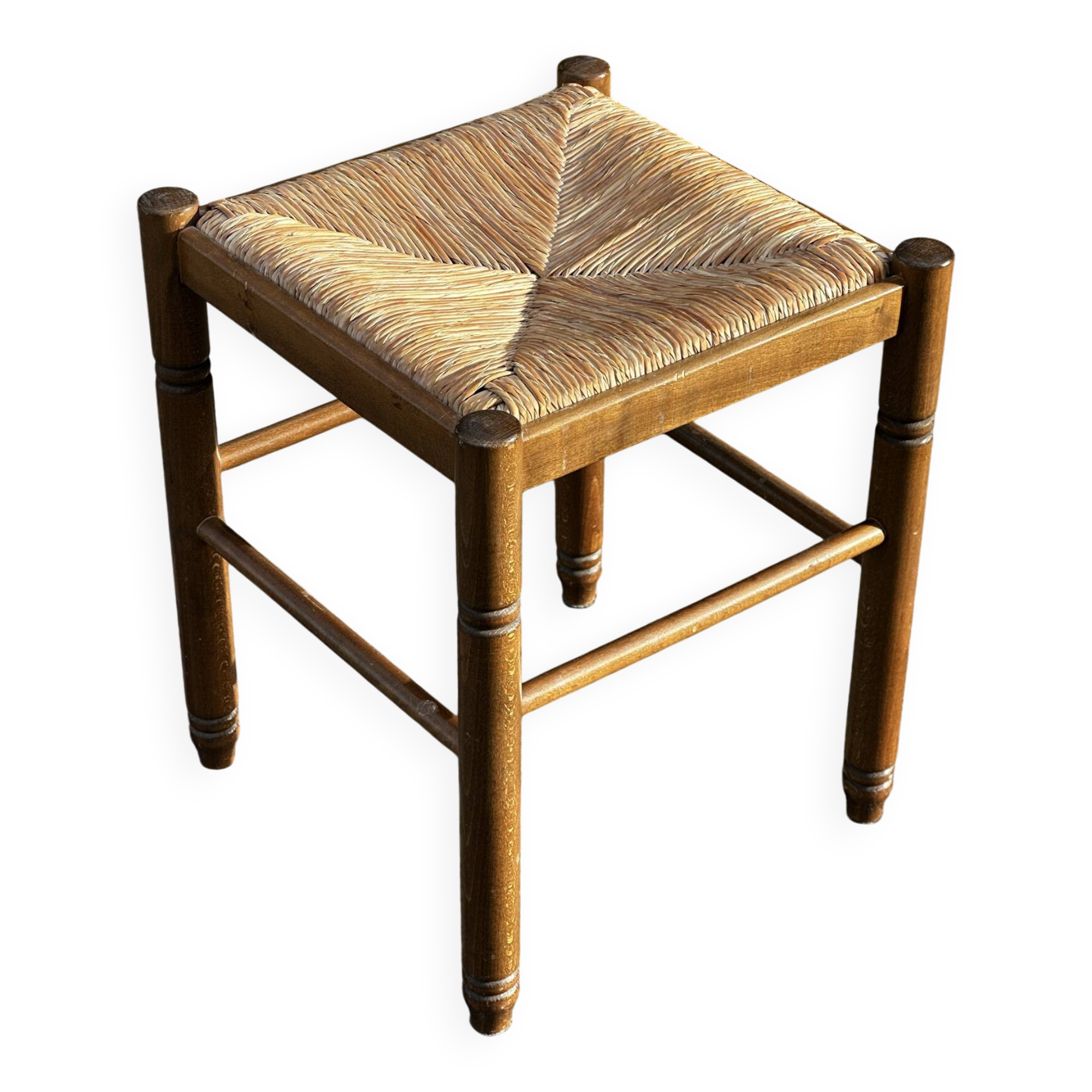 1950s turned wooden stool with a straw seat.