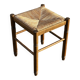 1950s turned wooden stool with a straw seat.
