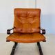Vintage Scandinavian cognac lounge chair by Oddvin Rykken