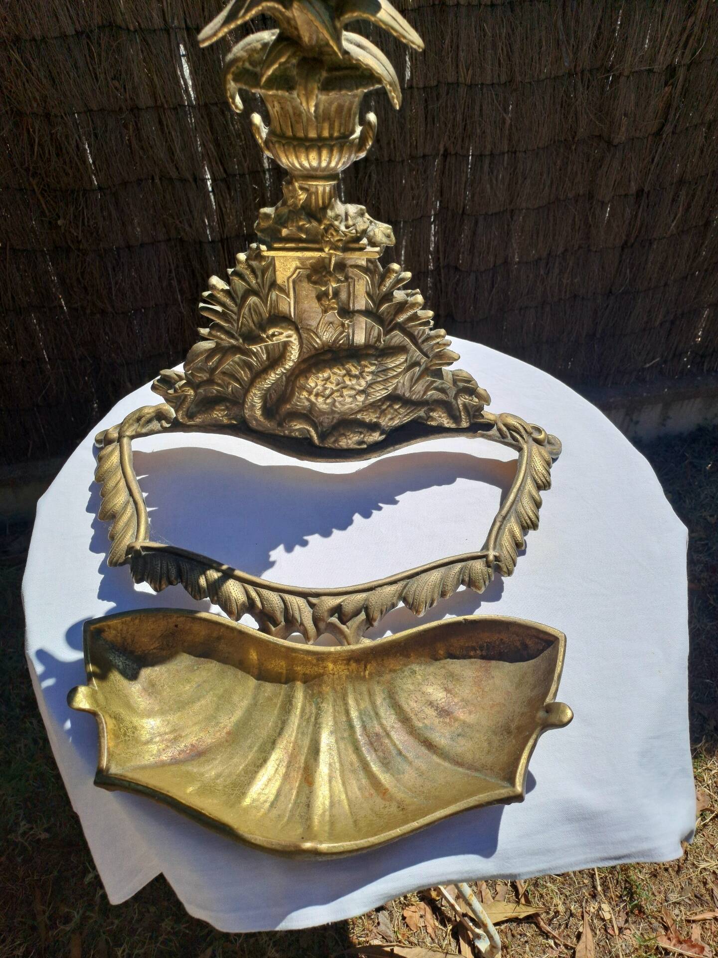 Bronze and brass umbrella stand decorated with a swan.