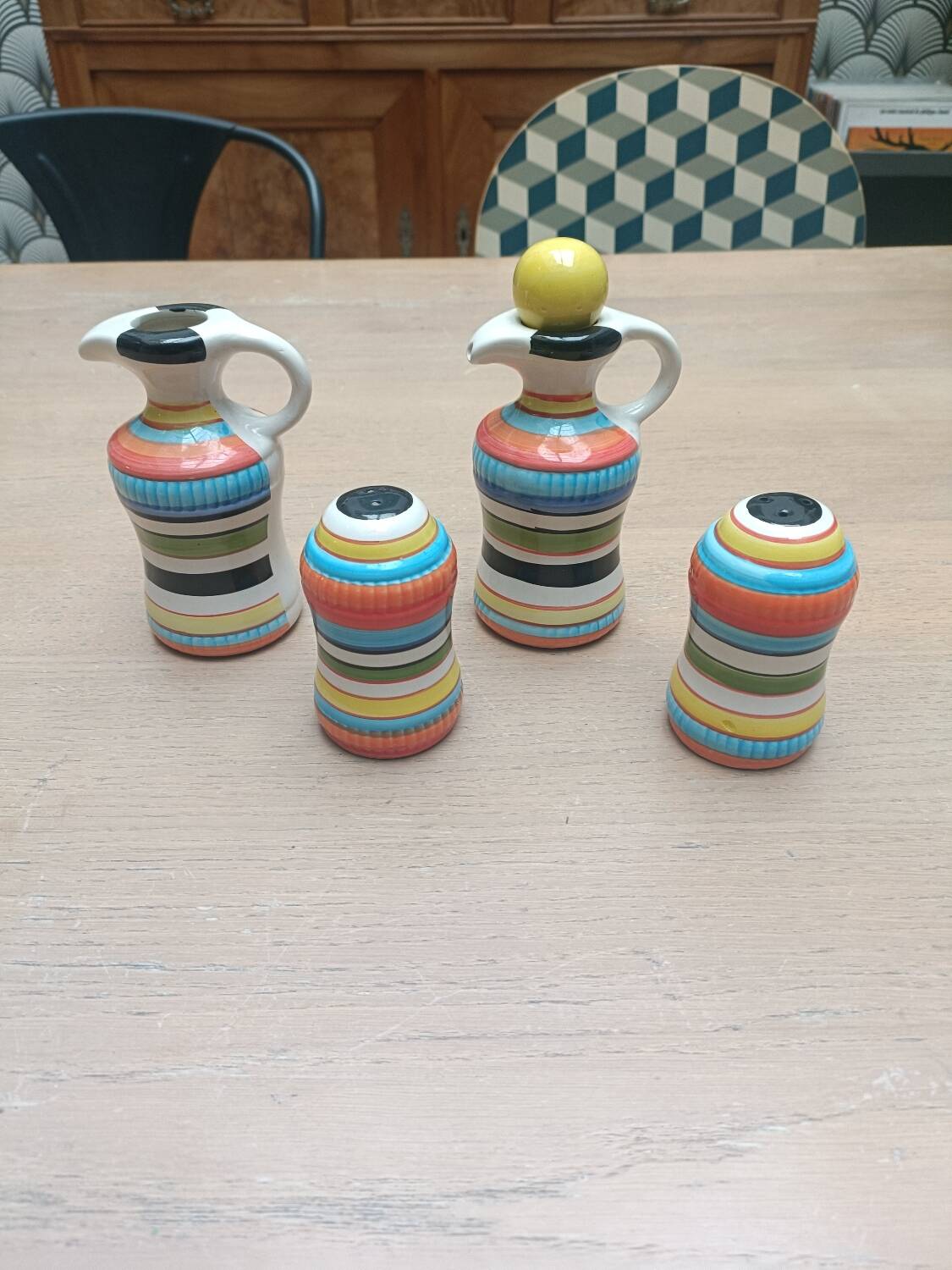 Vinegar and oil set, salt shaker and pepper shaker.