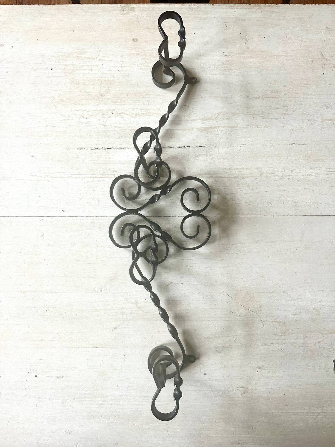 Old wrought iron coat rack