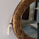 Art Deco oval mirror in gilded wood, France circa 1920