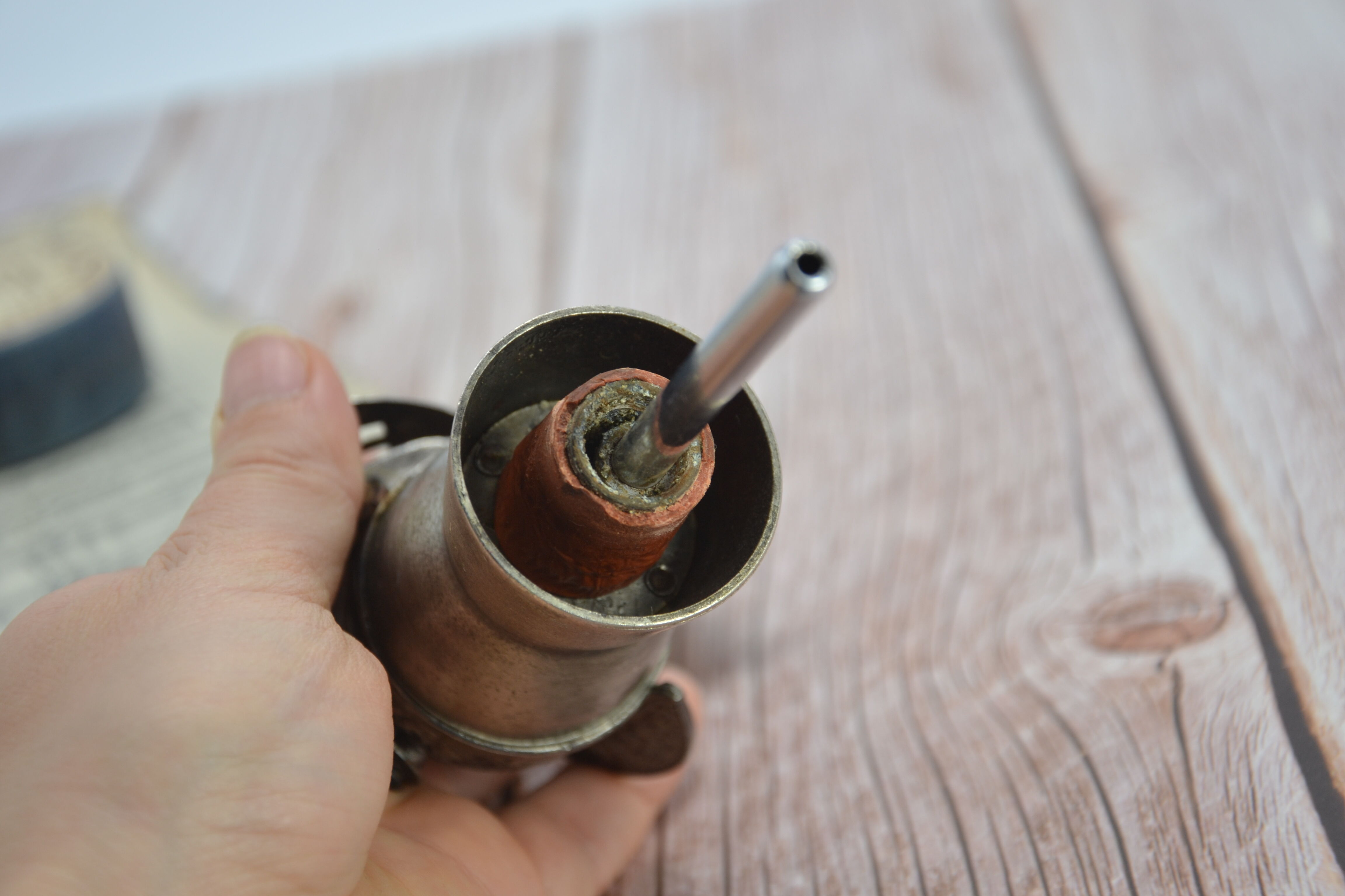 Old silver metal pouring cap