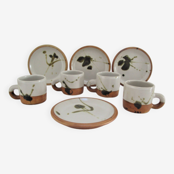 Four pottery cups and saucers from La Colombe Vallauris