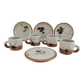 Four pottery cups and saucers from La Colombe Vallauris