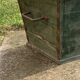 Large vintage 1940s forest green pine box, rustic utilitarian style.