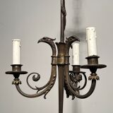 Empire-style bronze chandelier with 3 arms of light topped with eagle heads. French work. Circa 1900.