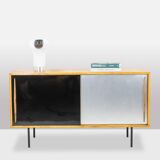 Low ash sideboard with sliding doors. 1960s.