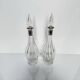 Pair of crystal decanters with solid silver mounts
