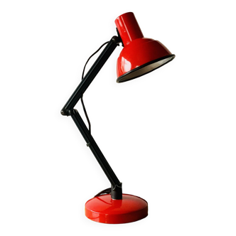 Old articulated desk lamp in red metal