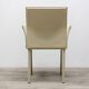 Beige leather chair with armrests