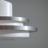 Doria pendant in opal glass with decorative aluminium discs
