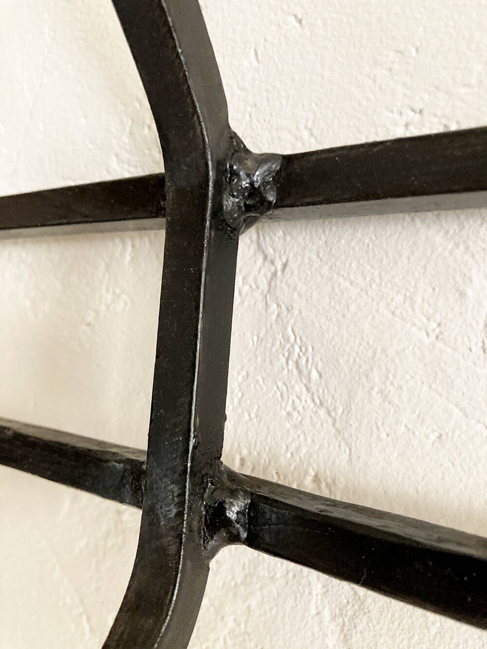 Wall-mounted coat rack with 12 hooks in handcrafted wrought iron