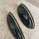 Set of two vintage wall sconces in pine green and gold.
