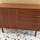 vintage storage unit in light walnut
