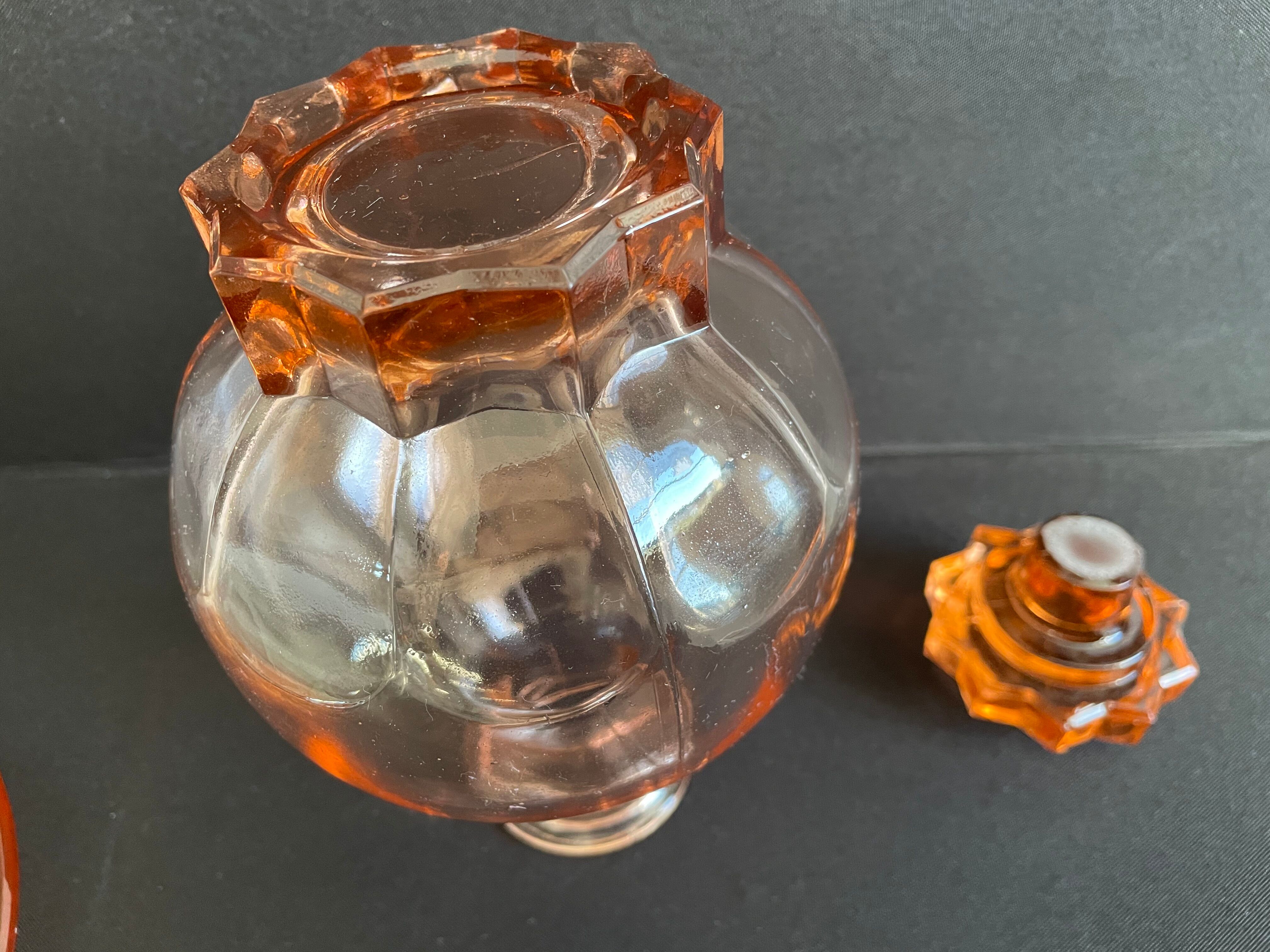 Liquor service in pink moulded glass