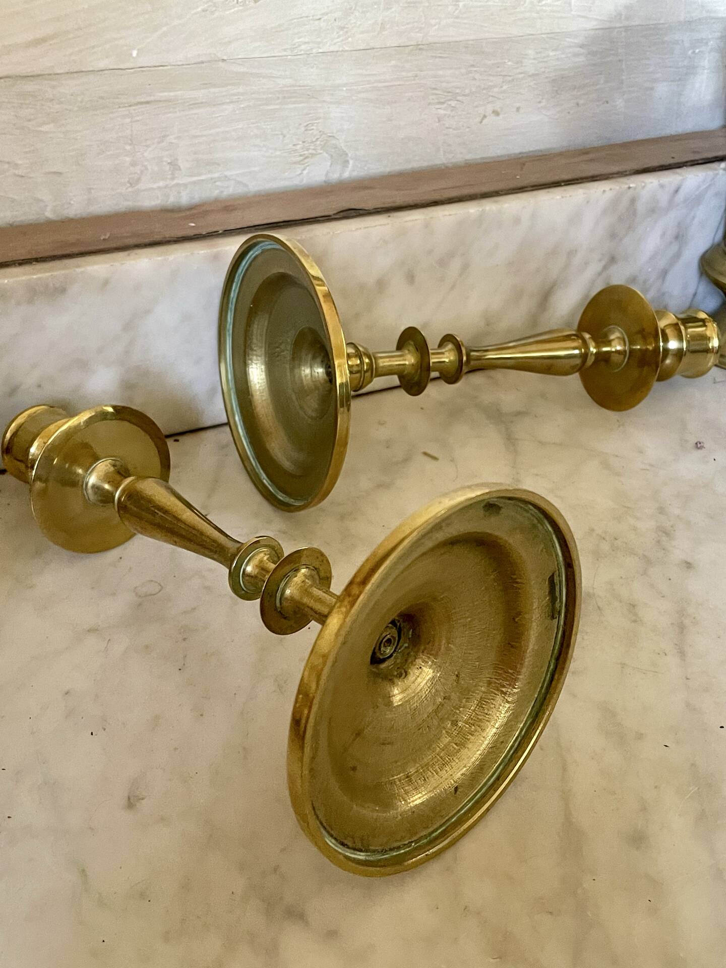 Old pair of turned brass candlesticks