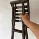 Folding slatted wooden stool