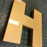 Golden sign letter h