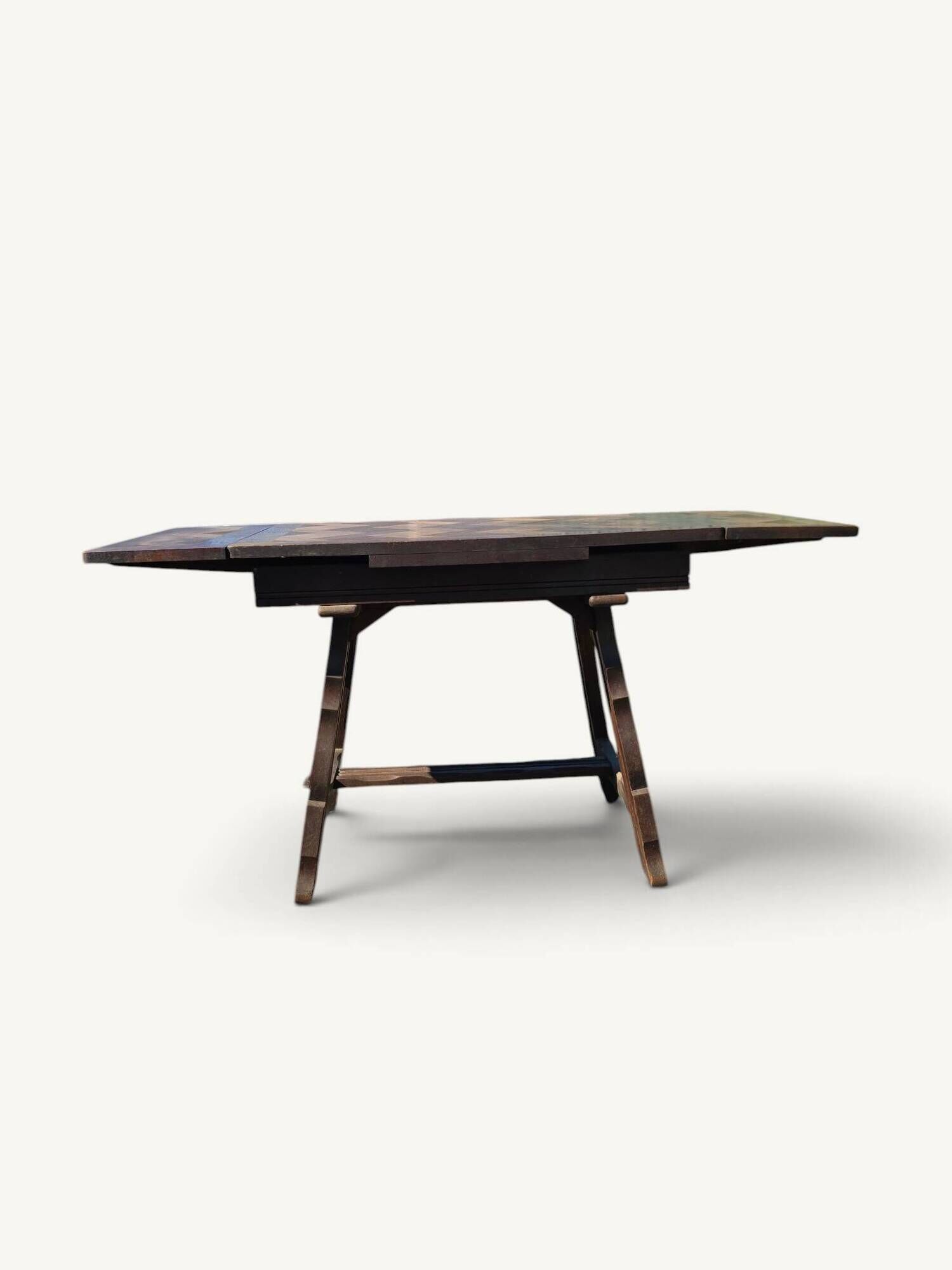 Rustic oak parquet dining table with two extensions.